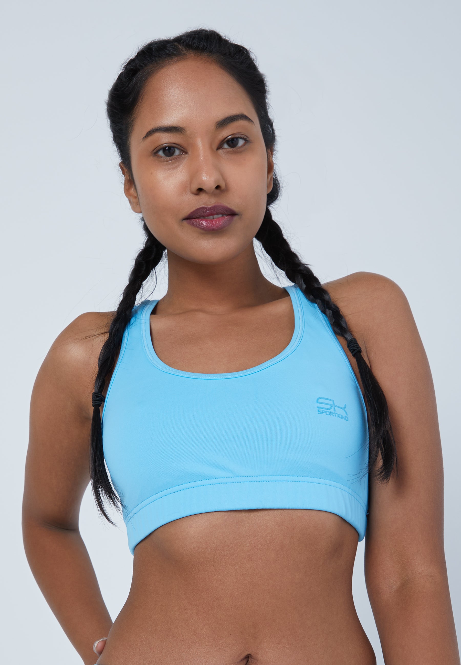 Sports bra with wide straps in light blue for girls and women