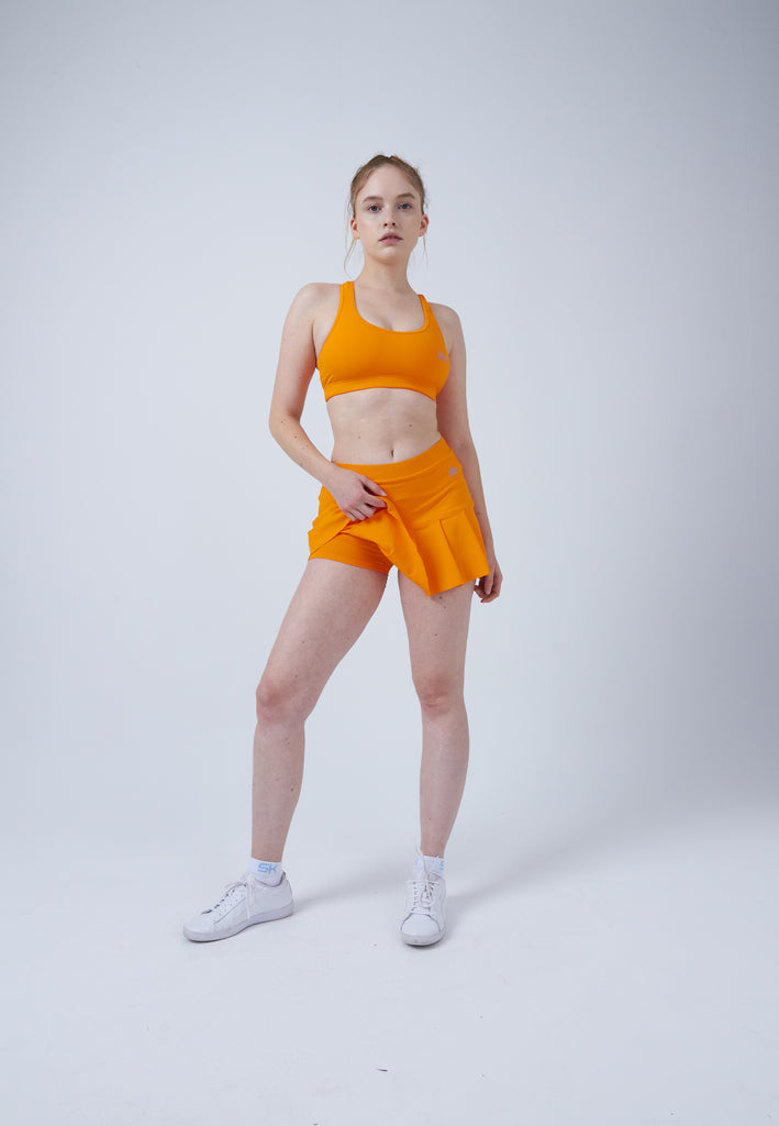 Mädchen & Damen und Gender Tennisrock mit Falten / Skort, orange von SPORTKIND